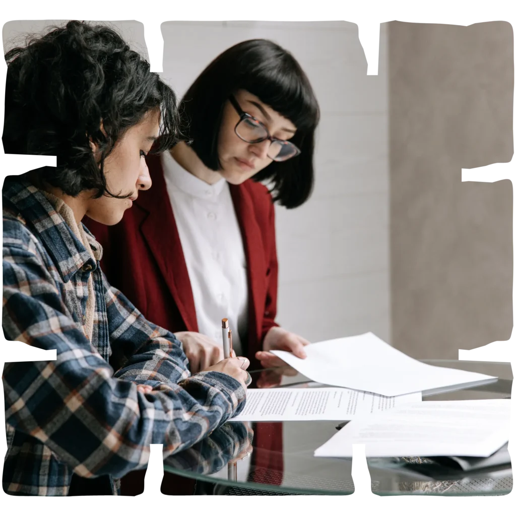 Real estate agent using phone and laptop for client and property management